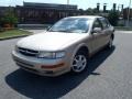 1999 Sunlit Sand Metallic Nissan Maxima GXE  photo #1