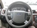 Medium Light Stone 2009 Ford Taurus SEL Steering Wheel