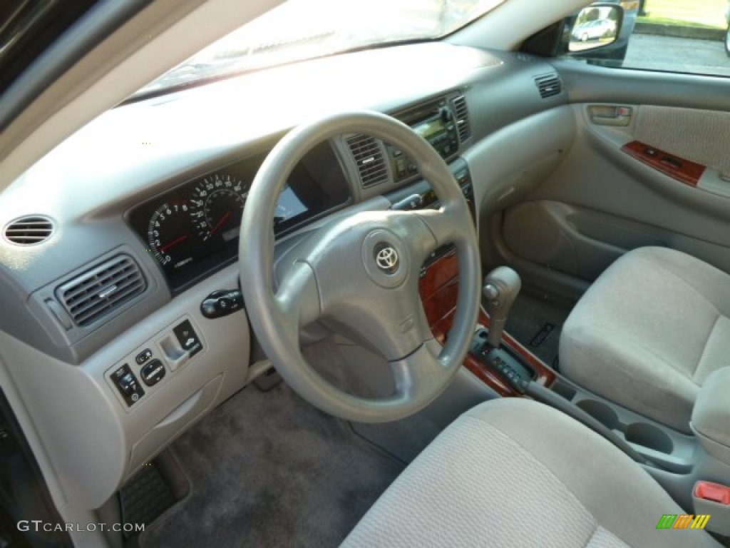 2005 Toyota Corolla LE Pebble Beige Dashboard Photo #52446217