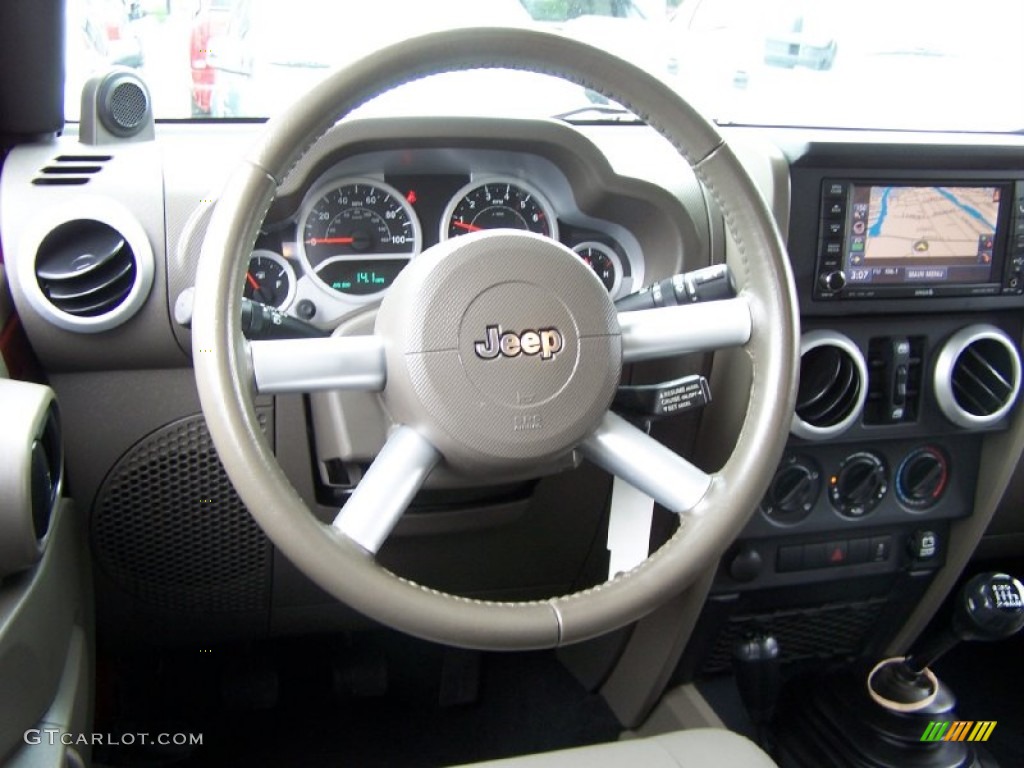 2010 Jeep Wrangler Unlimited Sahara 4x4 Dark Khaki/Medium Khaki Steering Wheel Photo #52461614