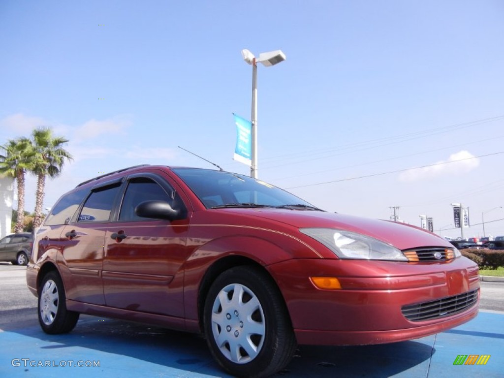 2004 Focus SE Wagon - Sangria Red Metallic / Medium Parchment photo #7