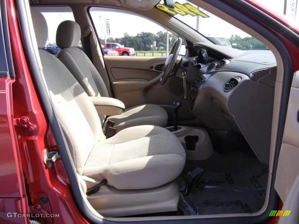 2004 Focus SE Wagon - Sangria Red Metallic / Medium Parchment photo #16