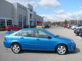 2007 Aqua Blue Metallic Ford Focus ZX4 SES Sedan  photo #2