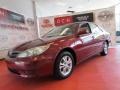 2005 Salsa Red Pearl Toyota Camry LE V6  photo #1