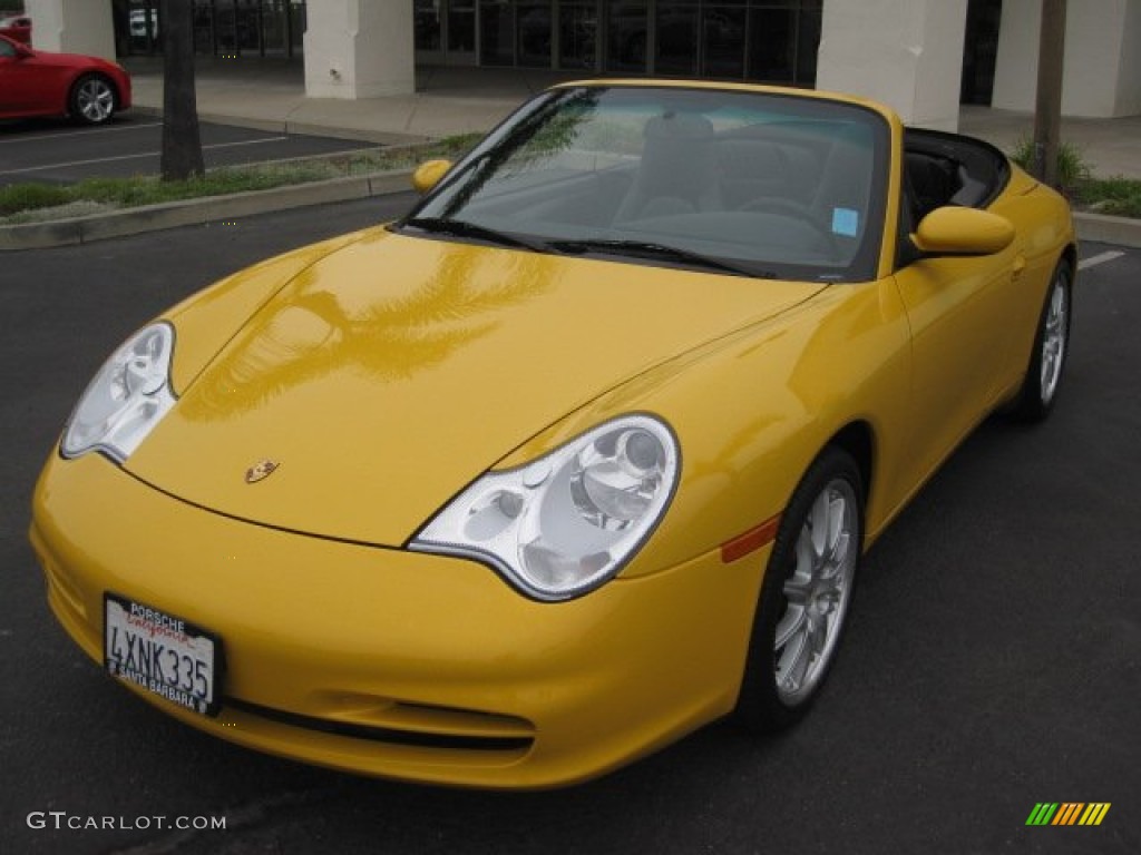 Speed Yellow 2002 Porsche 911 Carrera 4 Cabriolet Exterior Photo #52523754