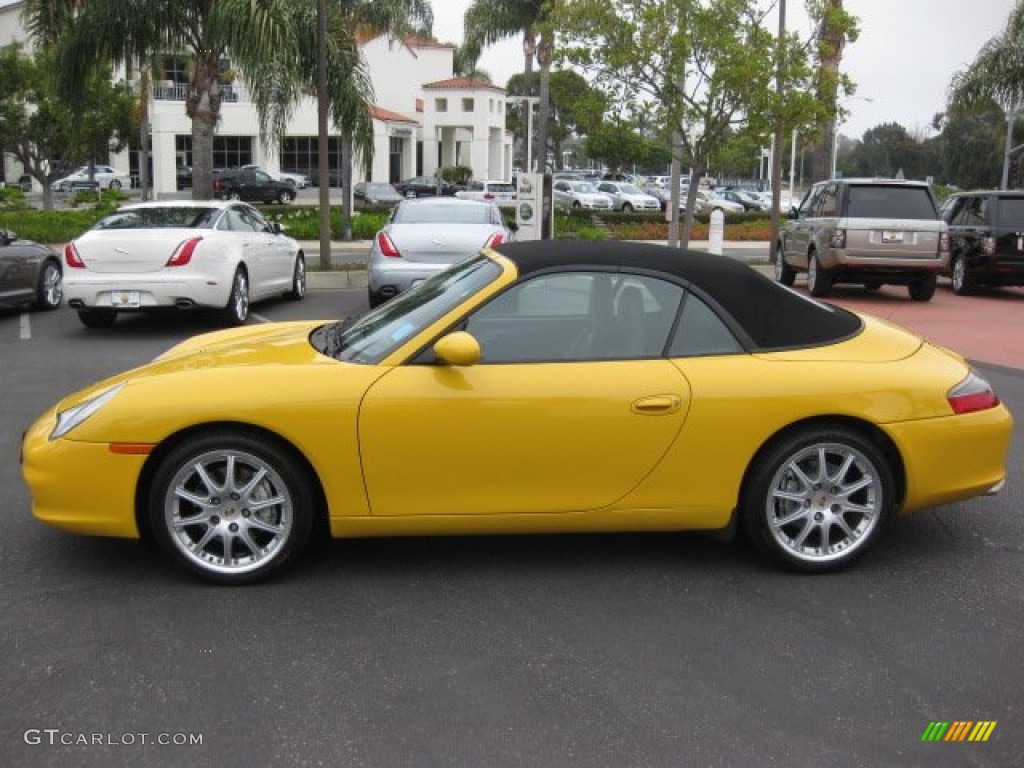 Speed Yellow 2002 Porsche 911 Carrera 4 Cabriolet Exterior Photo #52523820