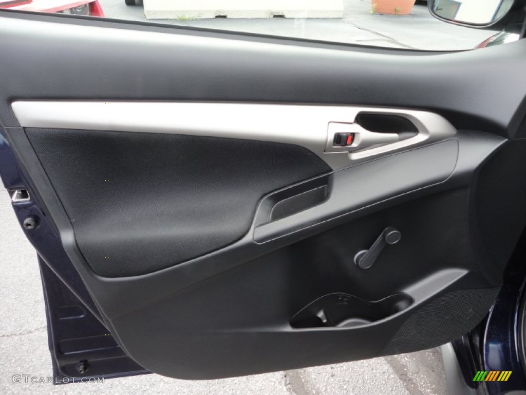 2010 Pontiac Vibe 1.8L Ebony Door Panel Photo #52576601