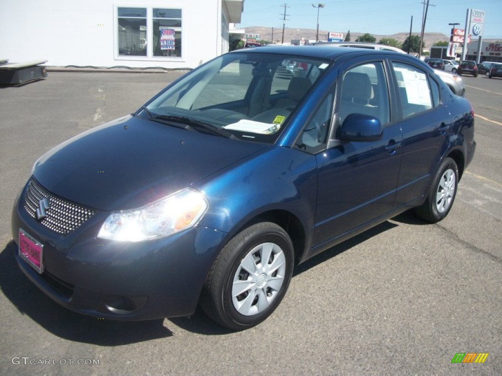 2010 SX4 Sedan LE - Deep Sea Blue Metallic / Beige photo #2
