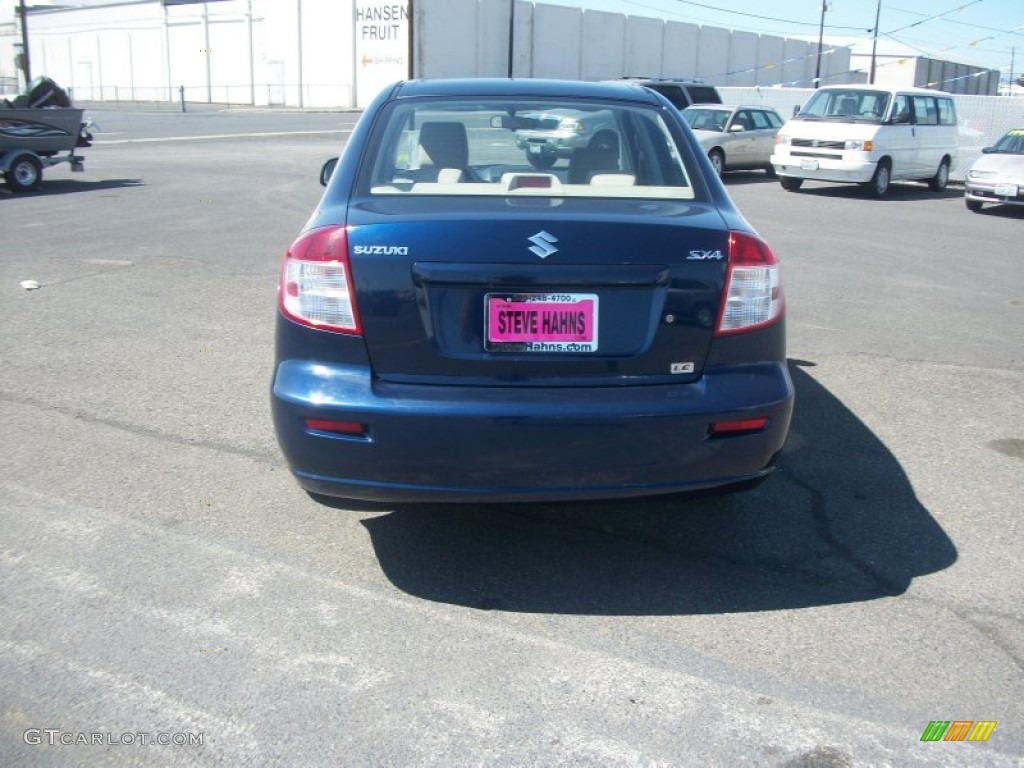2010 SX4 Sedan LE - Deep Sea Blue Metallic / Beige photo #4