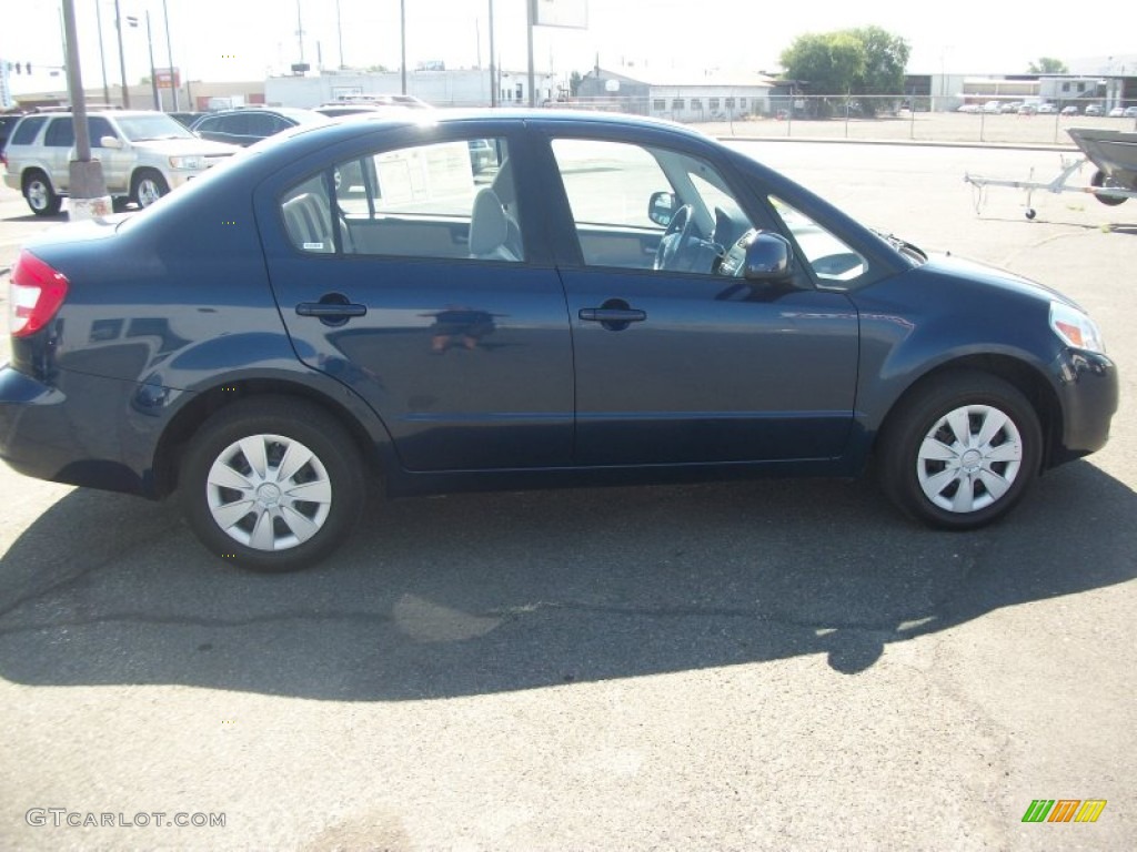 2010 SX4 Sedan LE - Deep Sea Blue Metallic / Beige photo #5