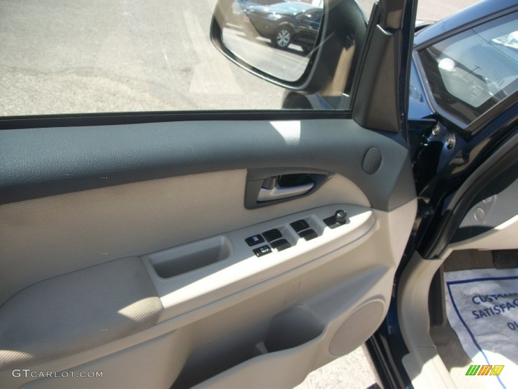 2010 SX4 Sedan LE - Deep Sea Blue Metallic / Beige photo #7