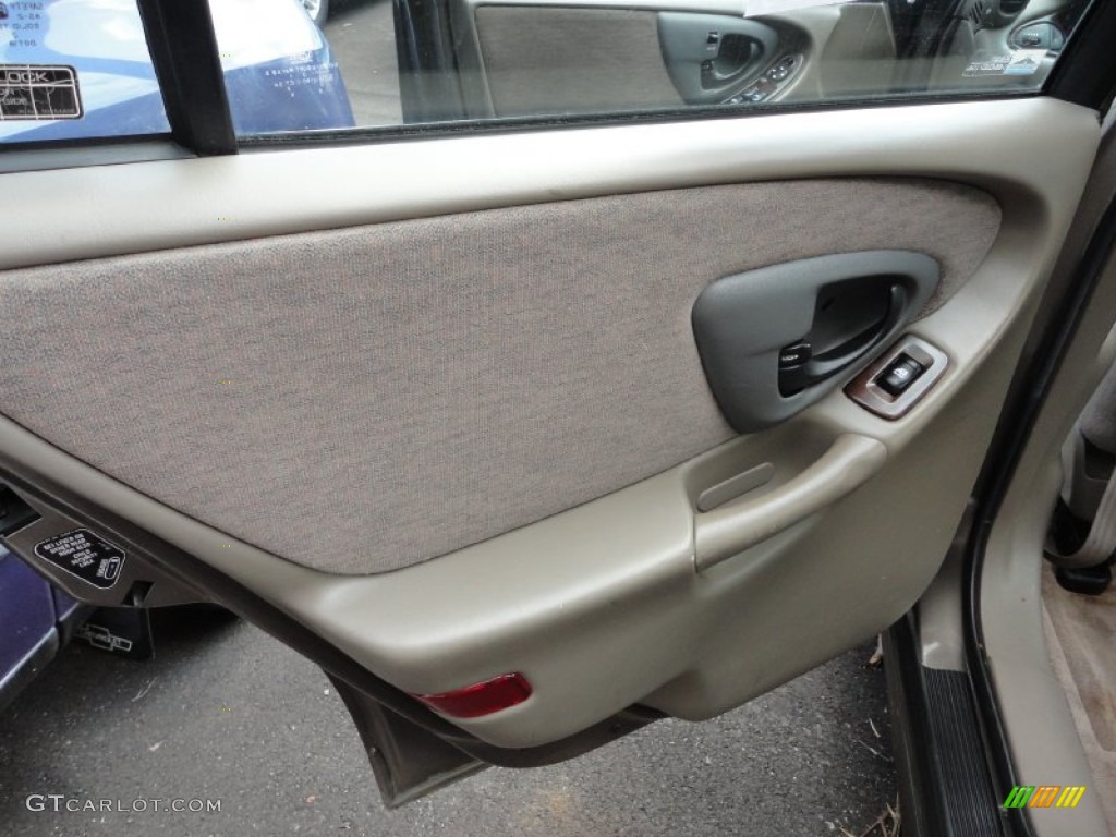1999 Chevrolet Malibu Sedan Medium Oak Door Panel Photo #52578755