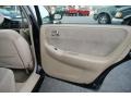 2000 Mazda 626 Beige Interior Door Panel Photo