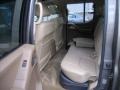 2005 Granite Metallic Nissan Frontier LE Crew Cab 4x4  photo #13