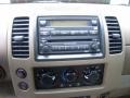 2005 Granite Metallic Nissan Frontier LE Crew Cab 4x4  photo #22