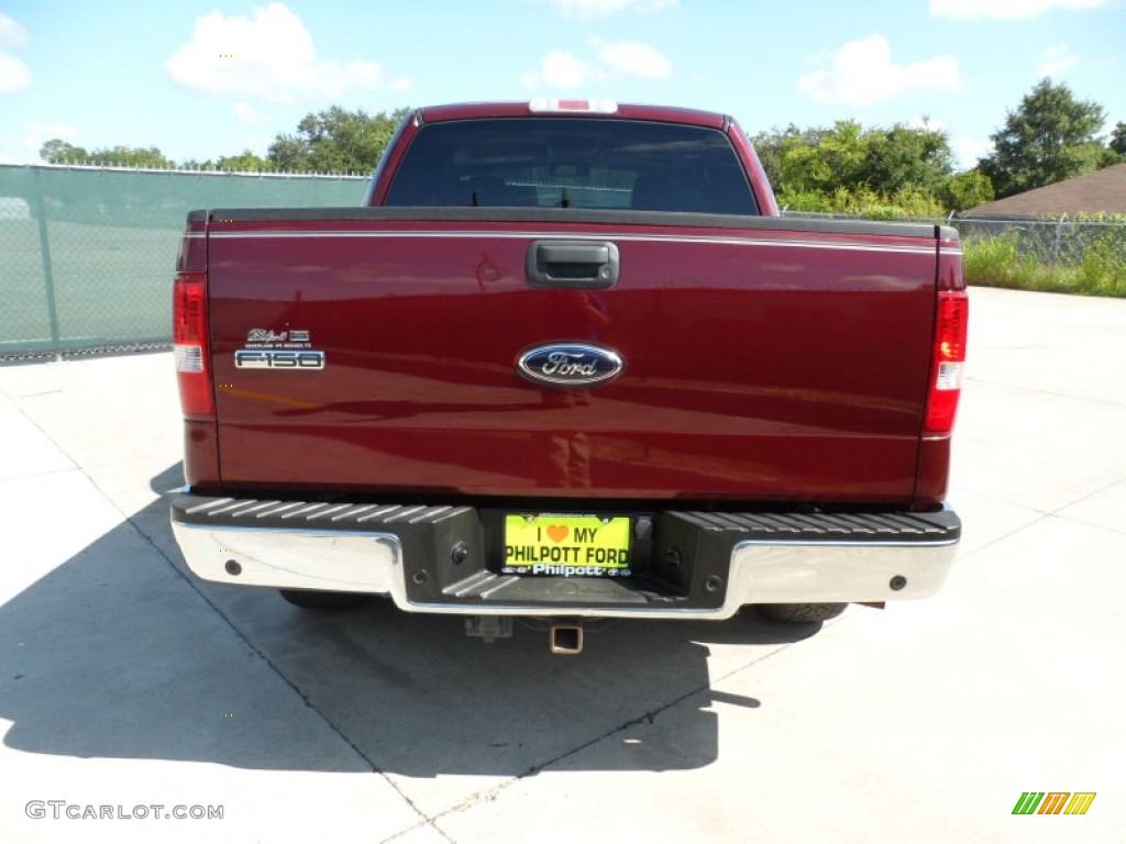 2006 F150 Lariat SuperCrew 4x4 - Dark Toreador Red Metallic / Black photo #4