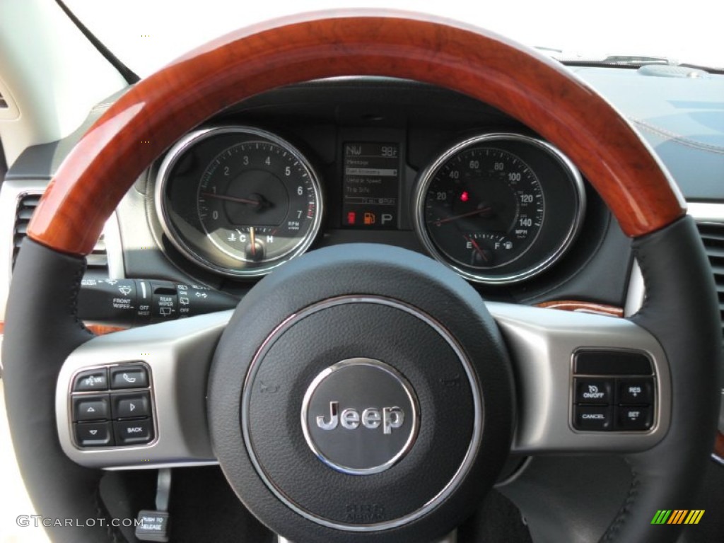 2011 Jeep Grand Cherokee Overland 4x4 New Saddle/Black Steering Wheel Photo #52611101