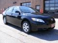 2009 Black Toyota Camry LE  photo #1