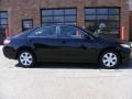 2009 Black Toyota Camry LE  photo #2