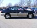 2002 Black Granite Pearl Subaru Outback Limited Sedan  photo #6