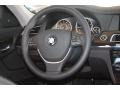 Black Steering Wheel Photo for 2012 BMW 7 Series #52648559