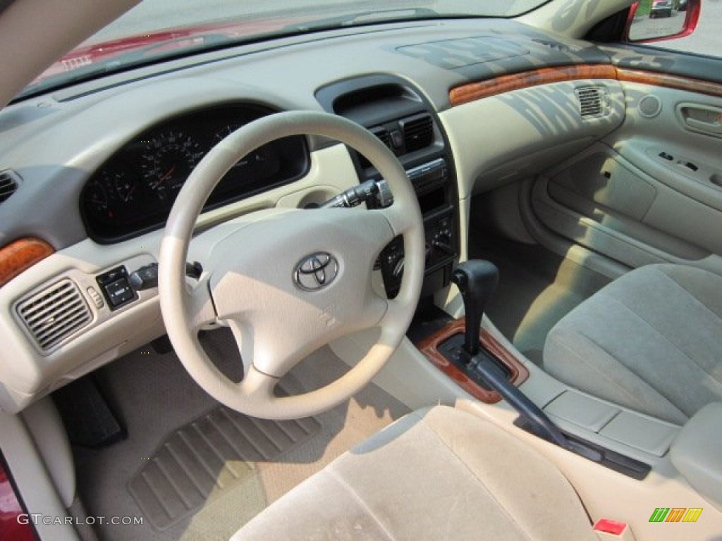 2003 Solara SE Coupe - Red Flame Metallic / Ivory photo #16