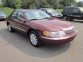 Autumn Red Metallic 2000 Lincoln Continental Standard Continental Model Exterior