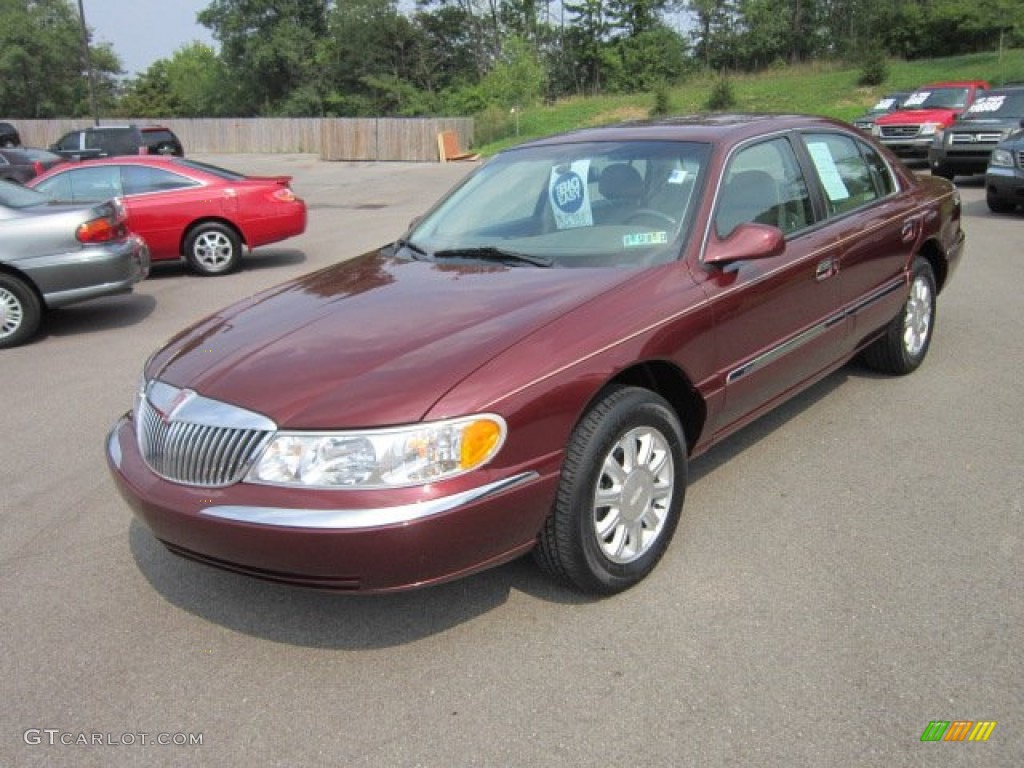 Autumn Red Metallic 2000 Lincoln Continental Standard Continental Model Exterior Photo #52681251