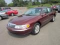 Autumn Red Metallic 2000 Lincoln Continental Standard Continental Model Exterior