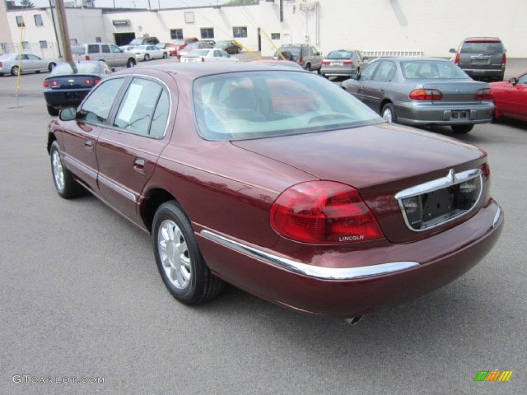Autumn Red Metallic 2000 Lincoln Continental Standard Continental Model Exterior Photo #52681278