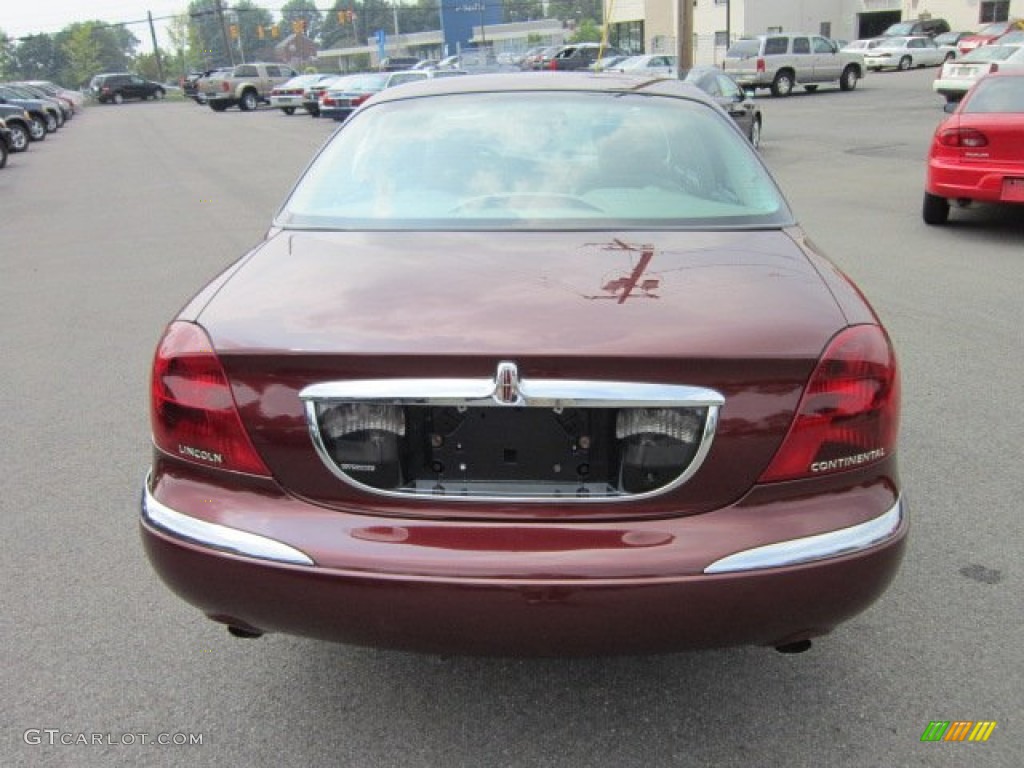 Autumn Red Metallic 2000 Lincoln Continental Standard Continental Model Exterior Photo #52681293