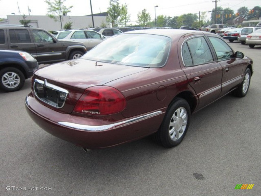 Autumn Red Metallic 2000 Lincoln Continental Standard Continental Model Exterior Photo #52681308