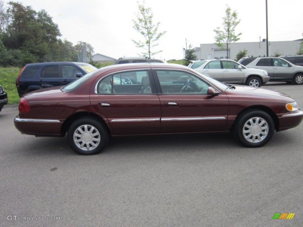 Autumn Red Metallic 2000 Lincoln Continental Standard Continental Model Exterior Photo #52681323