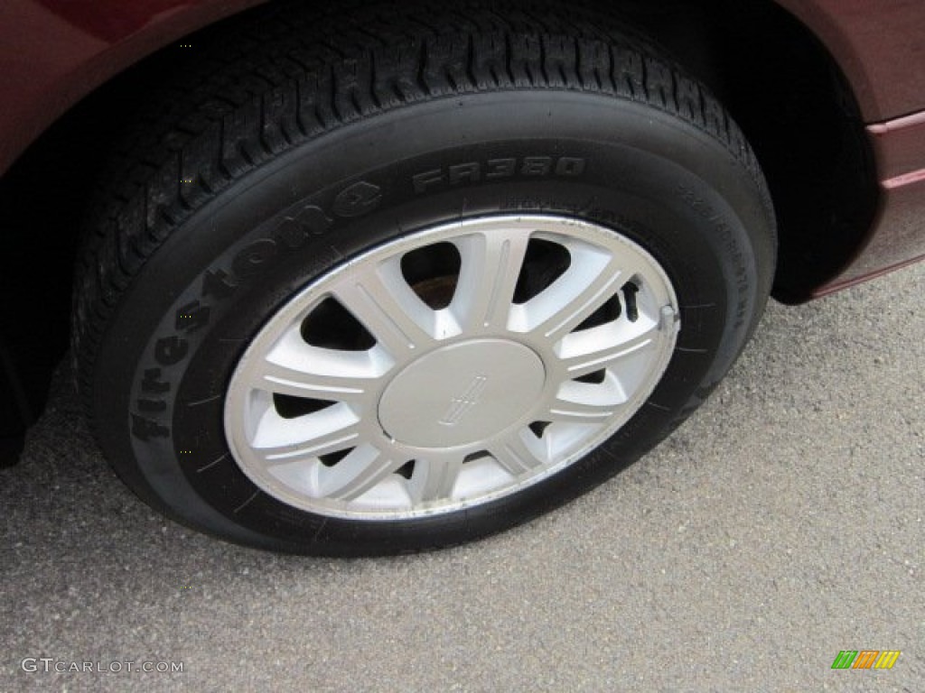 2000 Lincoln Continental Standard Continental Model Wheel Photo #52681338