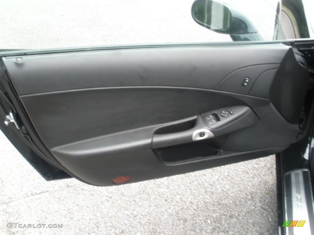 2009 Chevrolet Corvette Coupe Ebony Door Panel Photo #52701141
