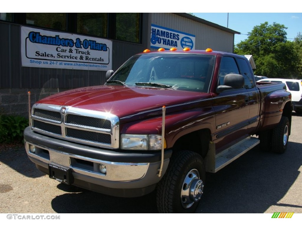 2002 Ram 3500 SLT Quad Cab 4x4 Dually - Dark Garnet Red Pearlcoat / Mist Gray photo #1