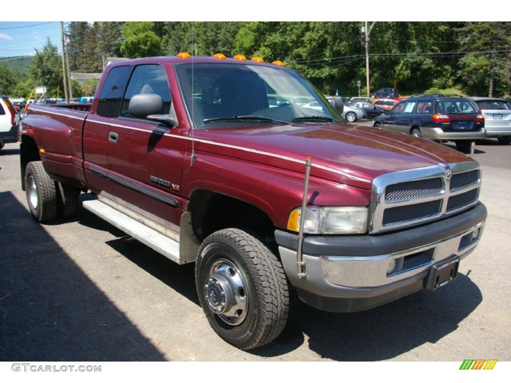 Dark Garnet Red Pearlcoat 2002 Dodge Ram 3500 SLT Quad Cab 4x4 Dually Exterior Photo #52716183