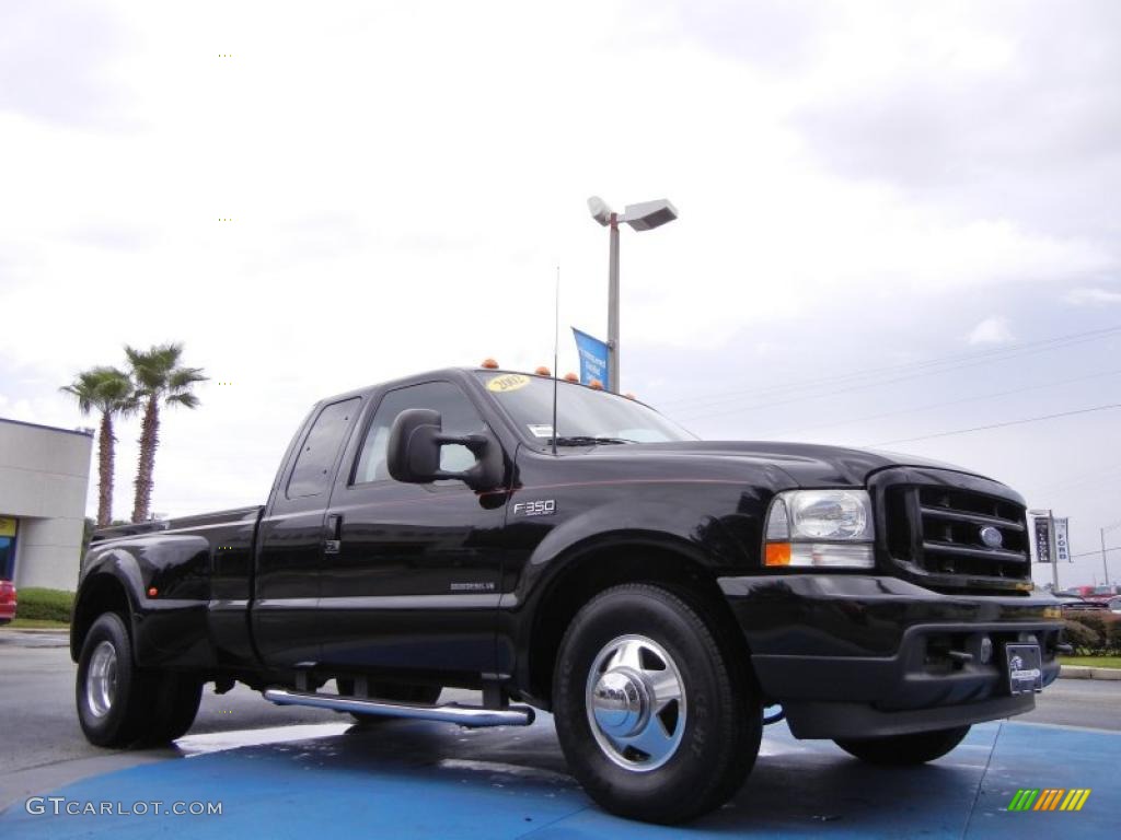 Black 2002 Ford F350 Super Duty XLT Crew Cab 4x4 Dually Exterior Photo #52766972