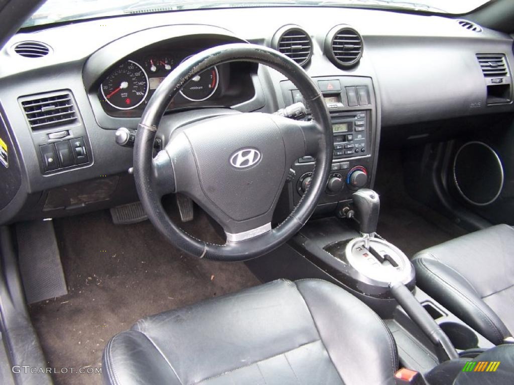2003 Hyundai Tiburon Standard Tiburon Model Black Dashboard Photo #52798108