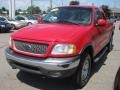 2002 Bright Red Ford F150 XLT SuperCab 4x4  photo #9