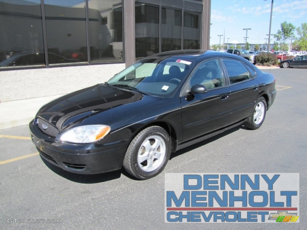 Black Ford Taurus