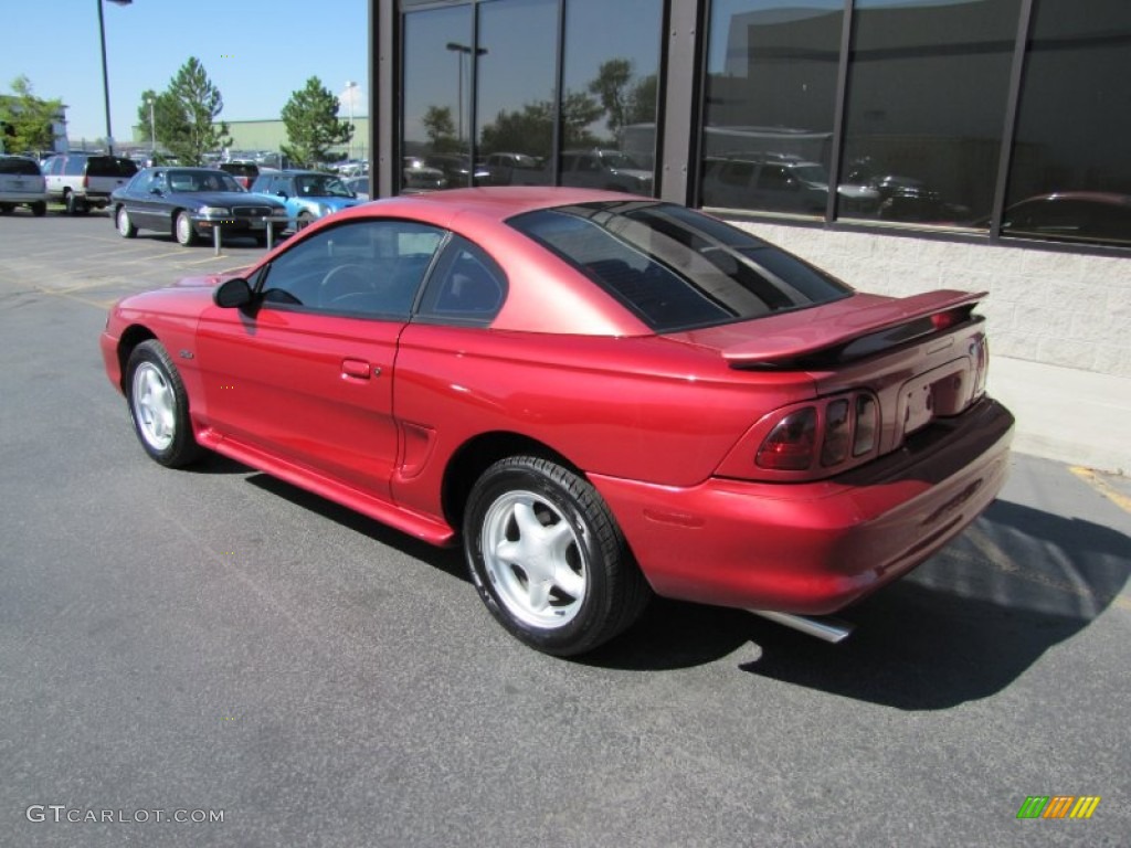 Laser Red Metallic 1997 Ford Mustang GT Coupe Exterior Photo #52837797