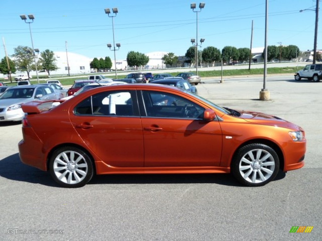 Rotor Glow Orange Metallic 2009 Mitsubishi Lancer RALLIART Exterior Photo #52850994