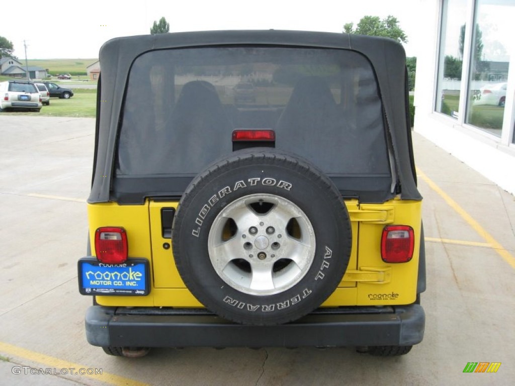 2002 Wrangler Sport 4x4 - Solar Yellow / Agate Black photo #9