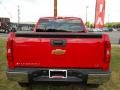 2009 Victory Red Chevrolet Silverado 1500 LS Extended Cab 4x4  photo #13