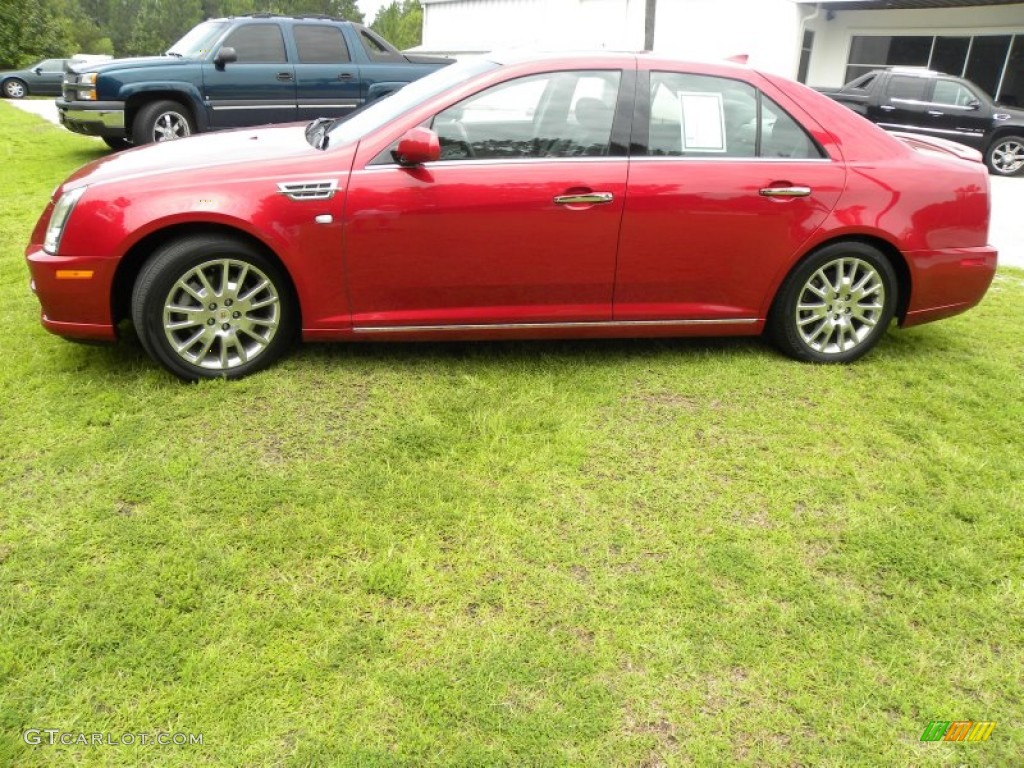 Crystal Red Tintcoat 2010 Cadillac STS V8 Exterior Photo #52856649