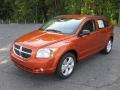 2011 Mango Tango Pearl Dodge Caliber Mainstreet  photo #1