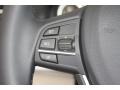 Oyster/Black Controls Photo for 2012 BMW 7 Series #52868025