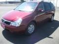 2012 Claret Red Kia Sedona LX  photo #2