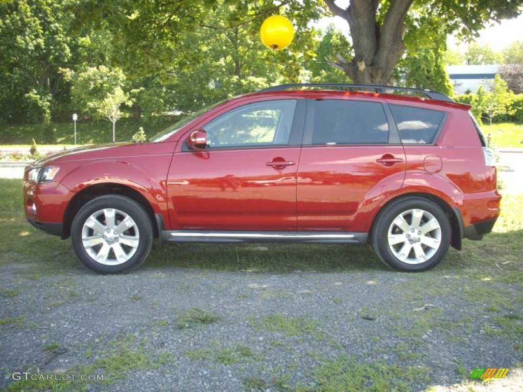 2011 Outlander SE - Rally Red Metallic / Black photo #2